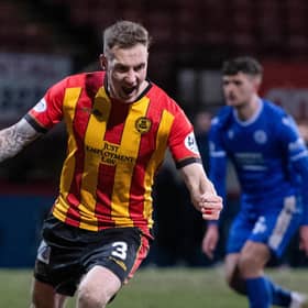 Thistle's Kevin Holt celebrates making it 1-0 during the cinch Championship match between Partick Thistle and Queen of the South at Firhill, on March 08, 2022, in Glasgow, Scotland.  (Photo by Ross MacDonald / SNS Group)