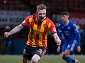 Thistle's Kevin Holt celebrates making it 1-0 during the cinch Championship match between Partick Thistle and Queen of the South at Firhill, on March 08, 2022, in Glasgow, Scotland.  (Photo by Ross MacDonald / SNS Group)