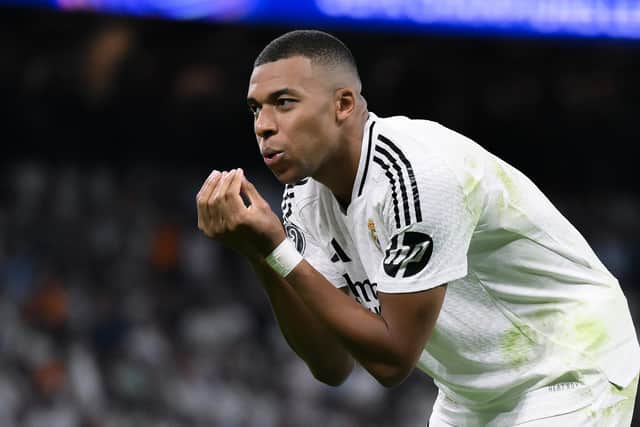 Kylian Mbappé celebrates scoring Real Madrid's first goal during last month's UEFA Champions League match against VfB Stuttgart. The French superstar is involved in a dispute with his previous club over a claim of unpaid wages (Picture: David Ramos/Getty Images)