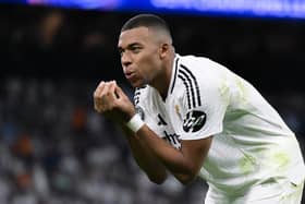Kylian Mbappé celebrates scoring Real Madrid's first goal during last month's UEFA Champions League match against VfB Stuttgart. The French superstar is involved in a dispute with his previous club over a claim of unpaid wages (Picture: David Ramos/Getty Images)