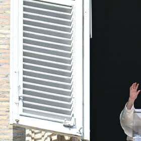 Pope Francis waves to the crowd during the Sunday Angelus prayer in St.Peter's Square at the Vatican on October 15, 2023. (Photo by ALBERTO PIZZOLI/AFP via Getty Images)