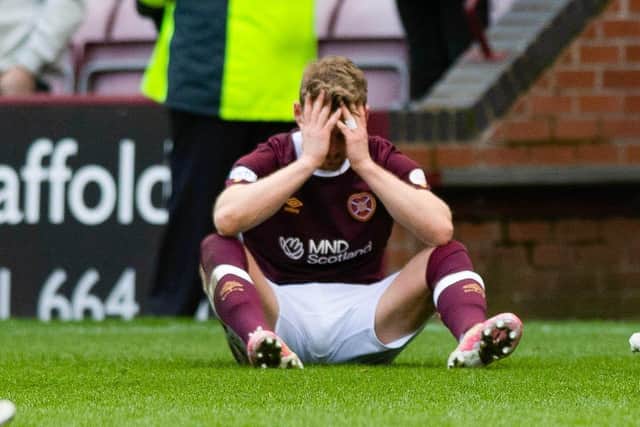 Hearts defender Stephen Kingsley shows his despair at full time after a 2-0 defeat by St Mirren.