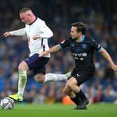 Wayne Rooney of England beats Martin Compston of Soccer Aid World XI during Soccer Aid for Unicef 2021 match between England and Soccer Aid World XI at Etihad Stadium on September 04, 2021 in Manchester, England. (Photo by Alex Livesey/Getty Images)