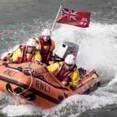 Aberdeen’s inshore lifeboat team launched a rescue mission after hearing reports of a man struggling to make it ashore on his surfboard at about 3.30pm today.