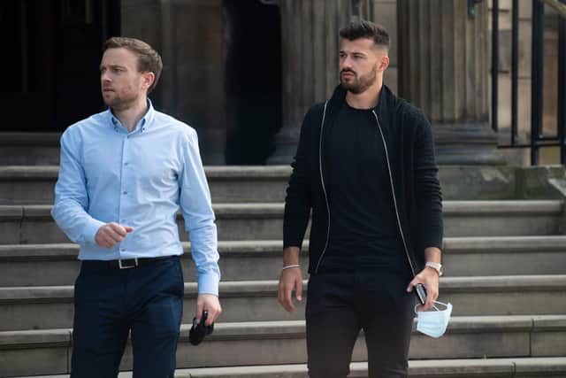 Swiss international Albian Ajeti was joined by his representative as he arrived in Glasgow for transfer talks. Picture: Craig Foy / SNS