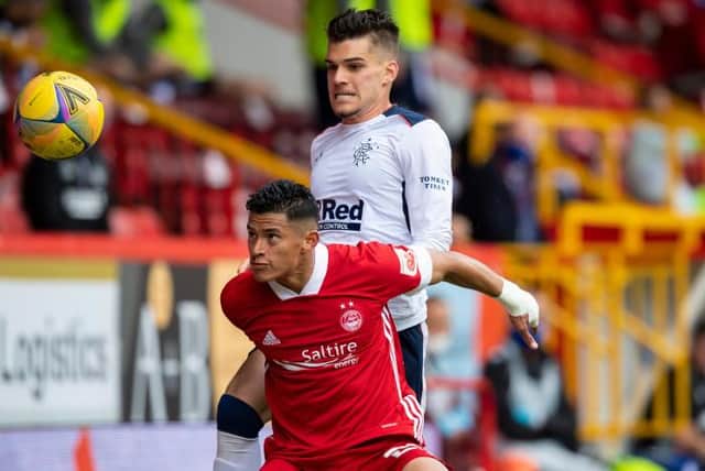Rangers' Ianis Hagi (right) battles with Aberdeen's Ronald Hernandez during the Scottish Premiership match in August (Photo by Craig Williamson / SNS Group)
