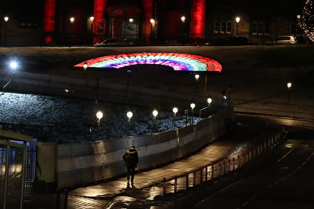 A rainbow remains lit up on the Mound. Photo credit: Andrew Milligan