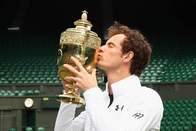 Andy Murray with the trophy after winning his second Wimbledon in 2016.  (Photo by Julian Finney/Getty Images)