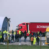 Freight lorries and drivers at Manston airfield, Kent, after French authorities announced that journeys from the UK will be allowed to resume after the coronavirus ban was lifted, but those seeking to travel must have a negative test result.