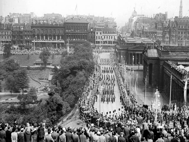 The Royal Procession travels up the Mound during the Queen's coronation visit in June 1953.