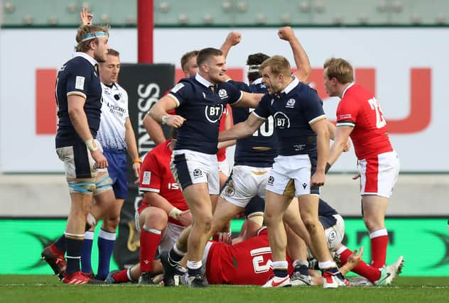 James Lang and Scott Steele celebrate as Scotland are awarded a penalty in the final play to secure victory. Picture: David Rogers/Getty Images