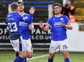 Queen of the South forward Euan East celebrates making it 2-1 during a cinch Championship match against Inverness.