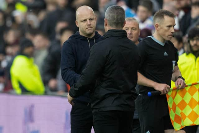 Hearts head coach Steven Naismith and his Hibs counterpart Nick Montgomery shake hands after the 2-2 draw at Tynecastle.