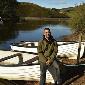 Kenny Knox, the new owner of Glencorse Trout Fishery pictured in the harbour with the water behind him. Glencorse hosts two of the Fastmail Tackle Pairs events this summer. Picture Nigel Duncan