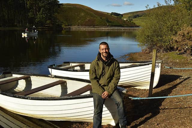 Kenny Knox, the new owner of Glencorse Trout Fishery pictured in the harbour with the water behind him. Glencorse hosts two of the Fastmail Tackle Pairs events this summer. Picture Nigel Duncan