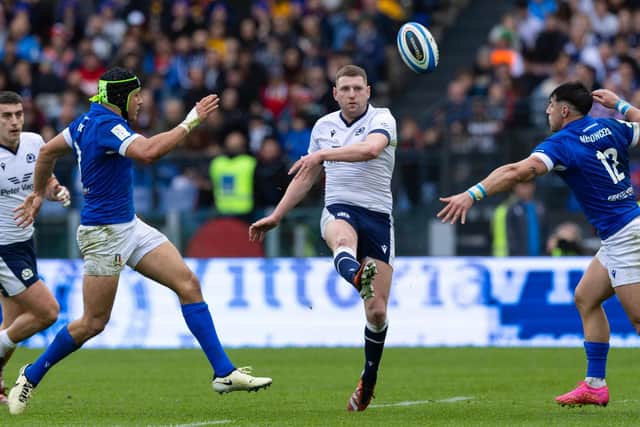 Scotland's Finn Russell kicks with his strong right foot against Italy in Rome during the Six Nations in March. (Photo by Craig Williamson / SNS Group)