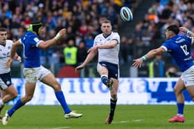 Scotland's Finn Russell kicks with his strong right foot against Italy in Rome during the Six Nations in March. (Photo by Craig Williamson / SNS Group)