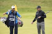Richie Ramsay and caddie Scott Carmichael on the 18th green during the third round of the 151st Open. Picture: Tom Russo/The Scotsman.