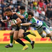 Duncan Paia'aua of RC Toulon is tackled by Matteo Minozzi and Tomas Albornoz of Benetton Rugby during the EPCR Challenge Cup Semi-Final match between RC Toulon and Benetton Rugby at Felix Mayol Stadium on April 30, 2023 in Toulon, France.