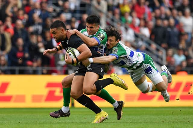 Duncan Paia'aua of RC Toulon is tackled by Matteo Minozzi and Tomas Albornoz of Benetton Rugby during the EPCR Challenge Cup Semi-Final match between RC Toulon and Benetton Rugby at Felix Mayol Stadium on April 30, 2023 in Toulon, France.