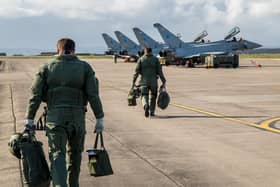 Pilots heading for four Royal Air Force Typhoons from 6 Sqn RAF Lossiemouth in April 2020. Picture: PA Media