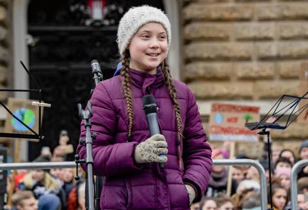 Swedish climate activist Greta Thunberg speaks on stage during a demonstration of students in Germany. (Picture: Axel Heimken/AFP/Getty Images)