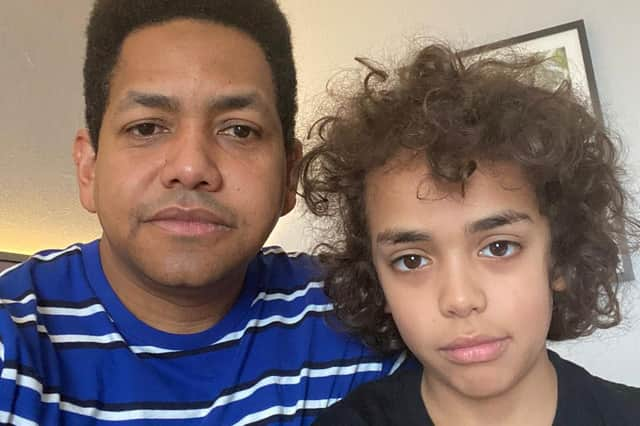 Antonio Caraballo and his son Sami, 10.