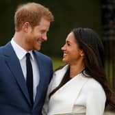 Happier times: Harry and Meghan before they gave up their royal duties and moved to the US.