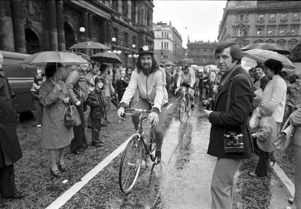 Scottish entertainer Billy Connolly leaves Glasgow on a sponsored cycle ride to Inverness in August 1980. Billy sets off from a rain-soaked George Square