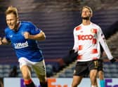 Scott Arfield celebrates his winning goal as Rangers defeated Standard Liege 3-2 at Ibrox to qualify for the last 32 of the Europa League. (Photo by Alan Harvey / SNS Group)
