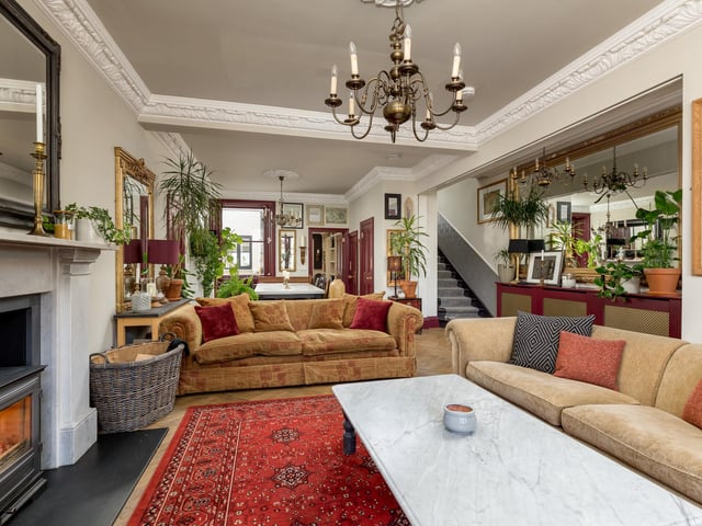 Interior: The home’s ground floor has a drawing room linking to an open-plan living, dining and kitchen area with sliding doors to the garden. The first floor consists of two ensuite bedrooms and a dressing room, while a principal ensuite bedroom with attractive balcony is on the third.