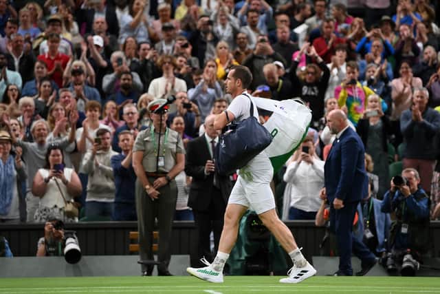 Andy Murray leaves the court after his second-round defeat to John Isner at Wimbledon. (Photo by Shaun Botterill/Getty Images)