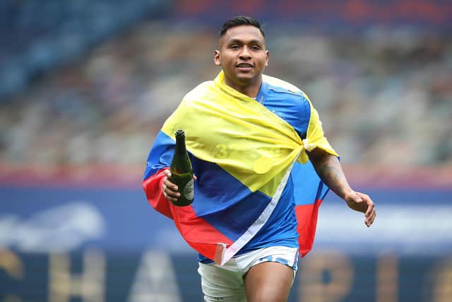 Alfredo Morelos celebrates Rangers' trophy day at Ibrox in May with his country's flag proudly draped around him. (Photo by Ian MacNicol/Getty Images)