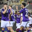Fiorentina's Nicolas Gonzalez, right, celebrates with Luka Jovic after scoring his side's third goal against Hearts on Thursday.
