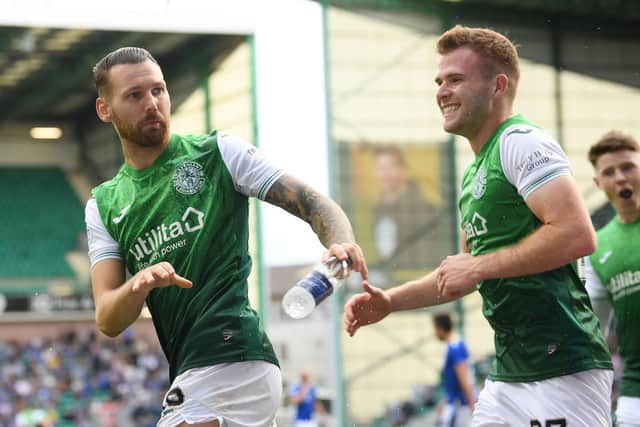 Martin Boyle celebrates with Chris Cadden.