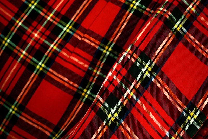 Kilts are tartan garments typically worn by men, the first mention of them is in 1538 when they were worn as full-length garments by Gaelic-speaking men in the Highlands. In those days they were worn virtually every day. These days, kilts still act as a symbol of Scottish heritage and pride, yet are often reserved more for special occasions like ceilidhs, weddings, or worn by pipe bands during concerts.