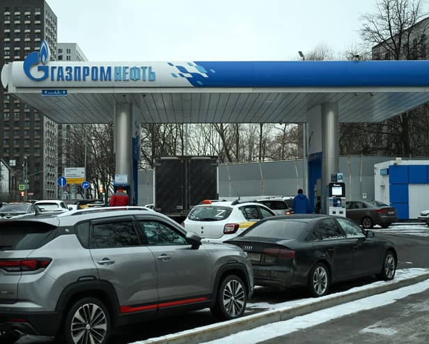 ​Cars queue to fill up at a Gazprom Neft petrol station in Moscow (PIcture: Natalia Kolesnikova/AFP via Getty Images)