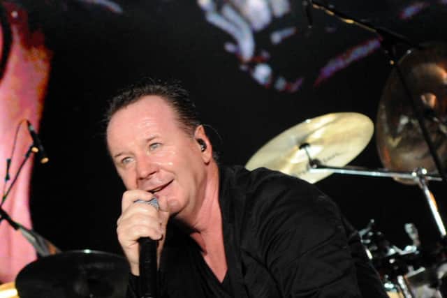 Jim Kerr of Simple Minds performs on stage in Singapore in 2009. Simple Minds new album, 'Direction Of The Heart' is released on 21st October (via BMG)  Pic: Alphonso Chan/Getty Images)