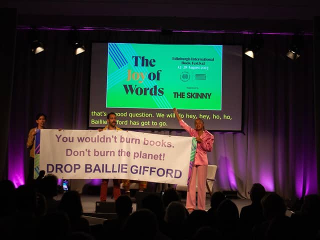 Author Mikaela Loach (far right) at the Edinburgh International Book Festival kickstarting a mass walkout from her panel show on the event's opening night to protest the festival having Baillie Gifford as one of its sponsors (pic: Harvey Blackmore)
