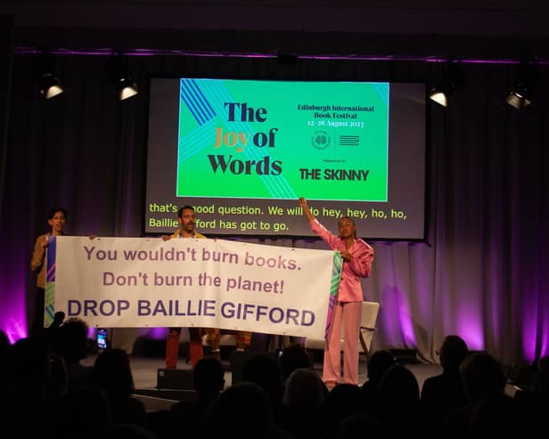 Author Mikaela Loach (far right) at the 2023 Edinburgh International Book Festival kickstarting a mass walkout from her panel show on the event's opening night to protest the festival having Baillie Gifford as one of its sponsors (pic: Harvey Blackmore)