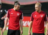 INSPIRING: Wales' Gareth Bale (left) and Aaron Ramsey during a training session at the Al Sadd Sports Club in Doha on Sunday, ahead of their World Cup opener against USA.