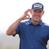 Lee Westwood jokingl gestures to a photographer about a recent English Premier League result during a practice round prior to the Abu Dhabi HSBC Championship at Yas Links. Picture: Ross Kinnaird/Getty Images.