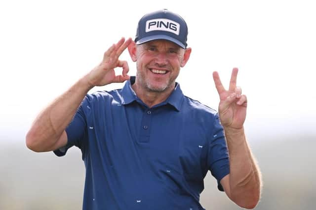 Lee Westwood jokingl gestures to a photographer about a recent English Premier League result during a practice round prior to the Abu Dhabi HSBC Championship at Yas Links. Picture: Ross Kinnaird/Getty Images.