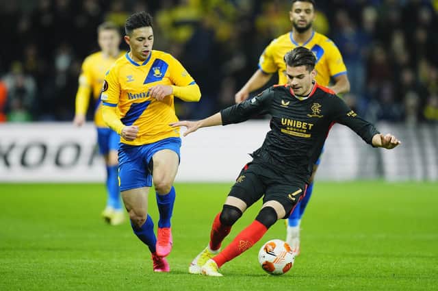 Rangers goalscorer Ianis Hagi is challenged by Brondby's Blas Riveros during the 1-1 Europa League Group A draw in Denmark. (Photo by MARTIN SYLVEST/Ritzau Scanpix/AFP via Getty Images)