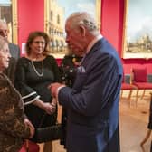 The Prince of Wales meets Holocaust survivor Rachel Levy as he attends an exhibition at The Queen's Gallery, Buckingham Palace. Picture: Arthur Edwards/The Sun/PA Wire