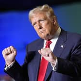 Republican presidential nominee Donald Trump dances at a campaign rally at Greensboro Coliseum (AP Photo/Alex Brandon)
