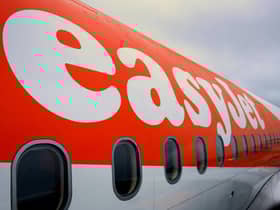 Delays in processing security checks for new airline crew are increasing the number of flights being cancelled, according to the boss of easyJet.
