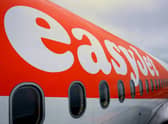 Delays in processing security checks for new airline crew are increasing the number of flights being cancelled, according to the boss of easyJet.