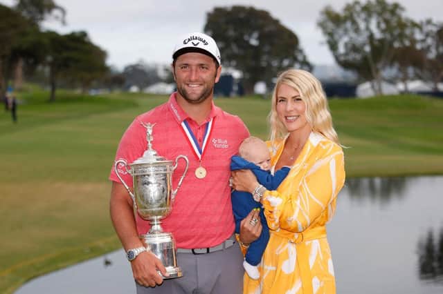 Jon Rahm of Spain celebrates with the trophy alongside his wife, Kelley, and son, Kepa, after winning the 2021 US Open at Torrey Pines. Picture: Ezra Shaw/Getty Images.