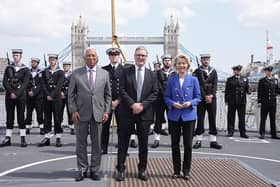 Prime Minister Sir Keir Starmer flanked by European Council President Antonio Costa and President of the European Commission Ursula von der Leyen in front of members of the Royal Navy on HMS Sutherland yesterday (Picture: Stefan Rousseau - WPA Pool/Getty Images)